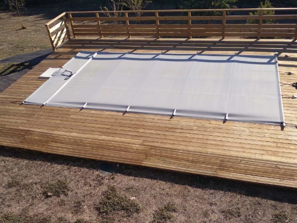 Couverture &agrave; barres piscine Jardin