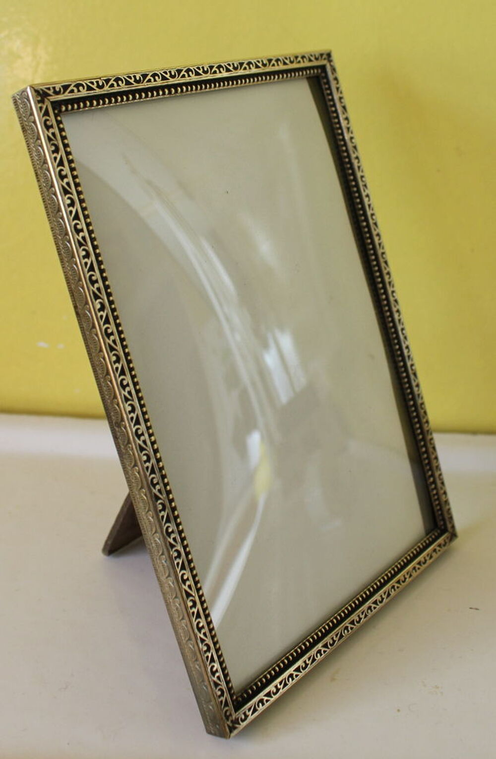 Cadre photo design scandinave, verre bomb&eacute;
sertissage laiton Décoration