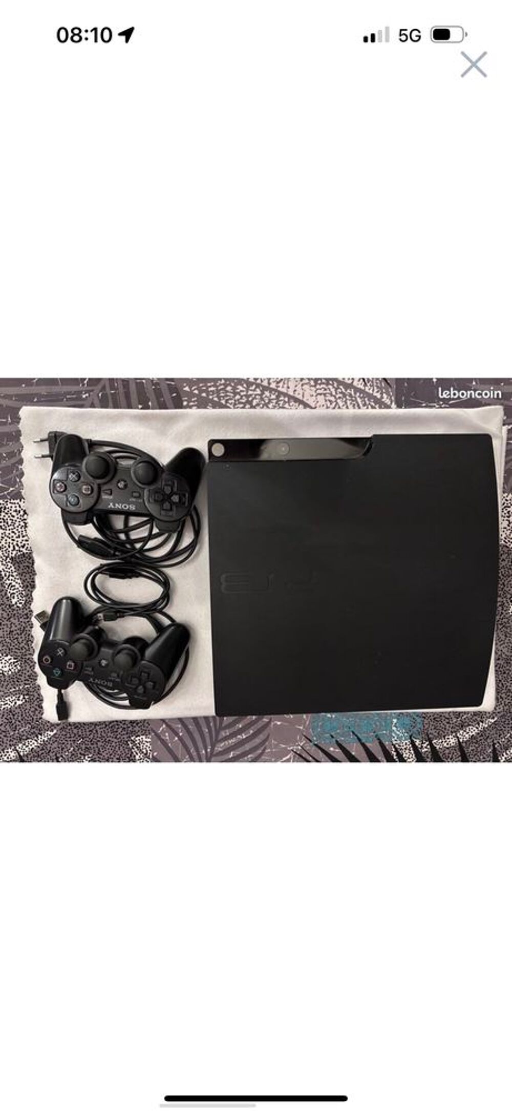 PS3 et ses deux manettes + tous me jeux Consoles et jeux vidéos