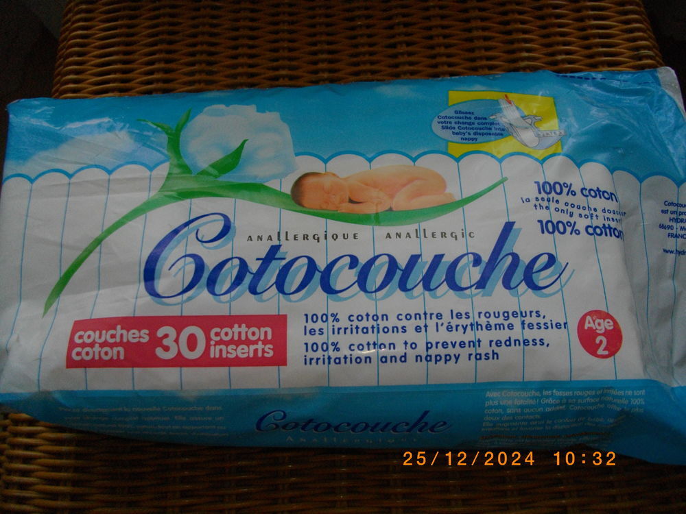 Un paquet de cotocouche pour b&eacute;b&eacute; Age 2 (paquet peu entam&eacute;) Puériculture