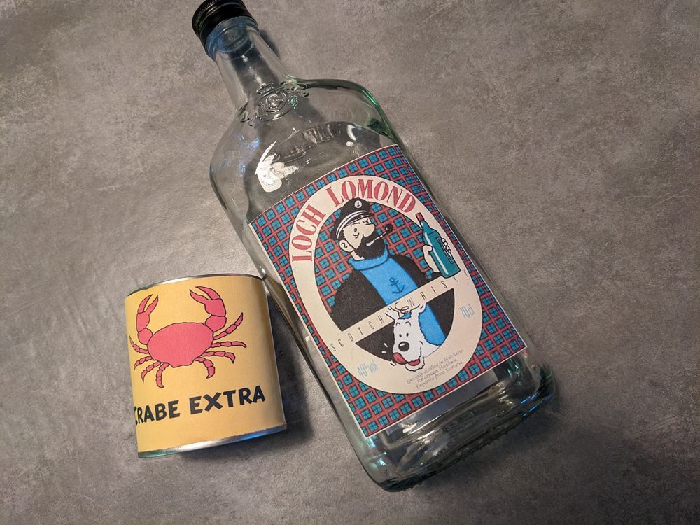 tintin et Milou bo&icirc;te de conserve plus bouteille du capitain Bricolage