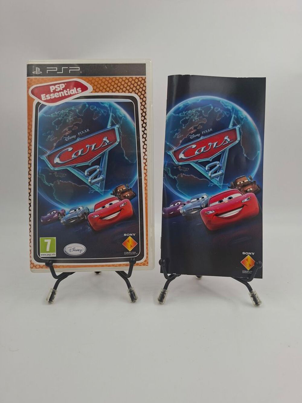 Jeu Playstation Portable (PSP) Disney Pixar Cars 2 complet Consoles et jeux vidéos