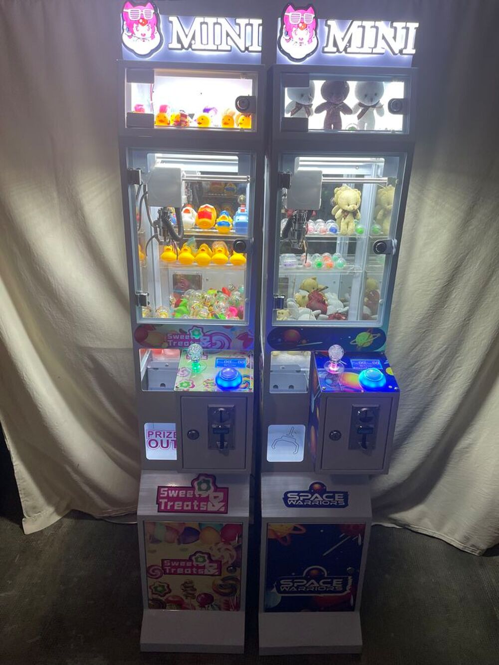 Machine &agrave; pince attrape peluche Jeux / jouets