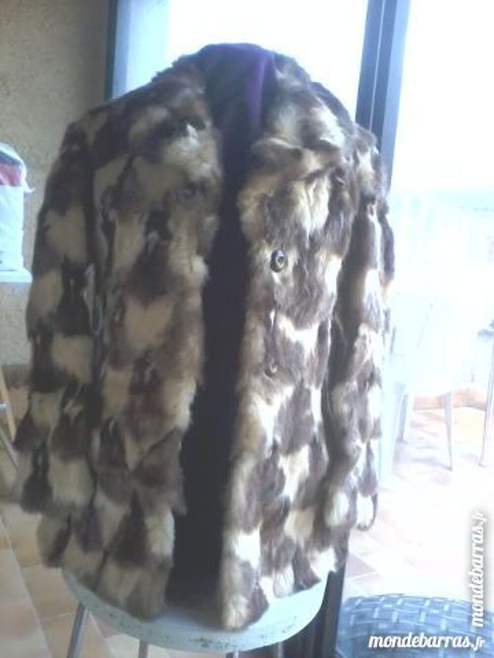 TRES BELLE FOURRURE Vêtements