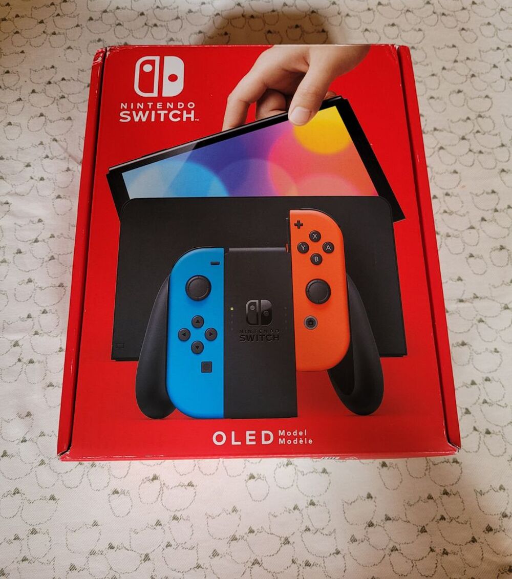 Nintendo Switch Oled avec housse et jeux Consoles et jeux vidéos