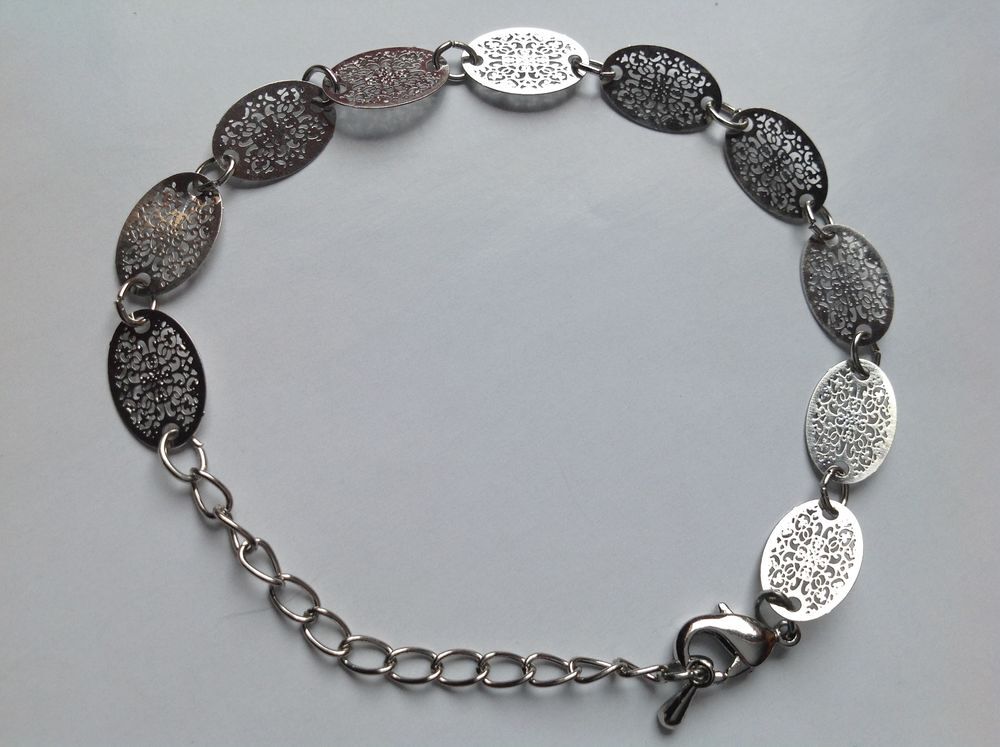 BRACELET OVALE ARGENT&Eacute; ARABESQUES 23 cm Envoi Possible
Bijoux et montres
