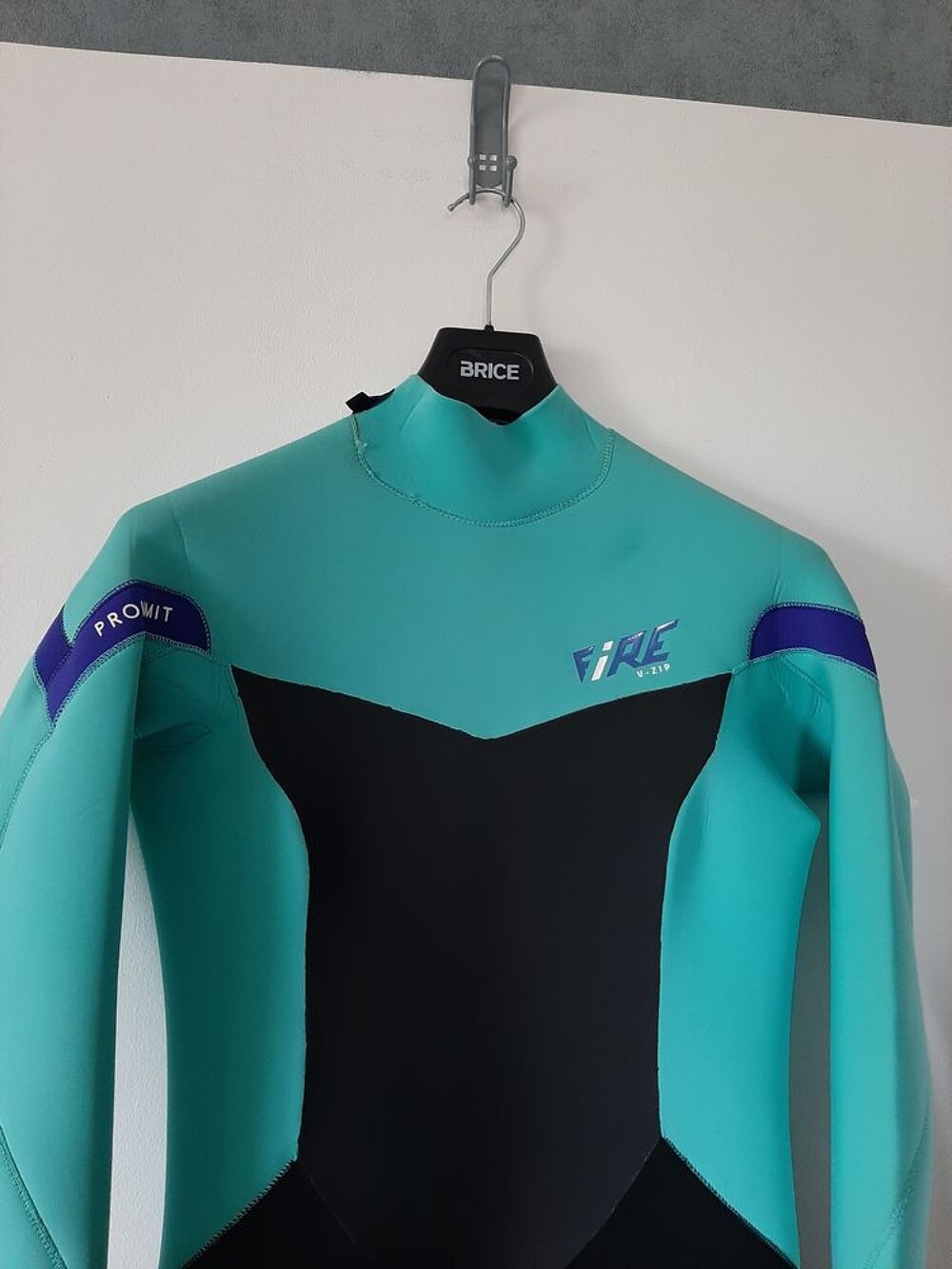 Combinaison int&eacute;grale n&eacute;opr&egrave;ne noir turquoise Sports