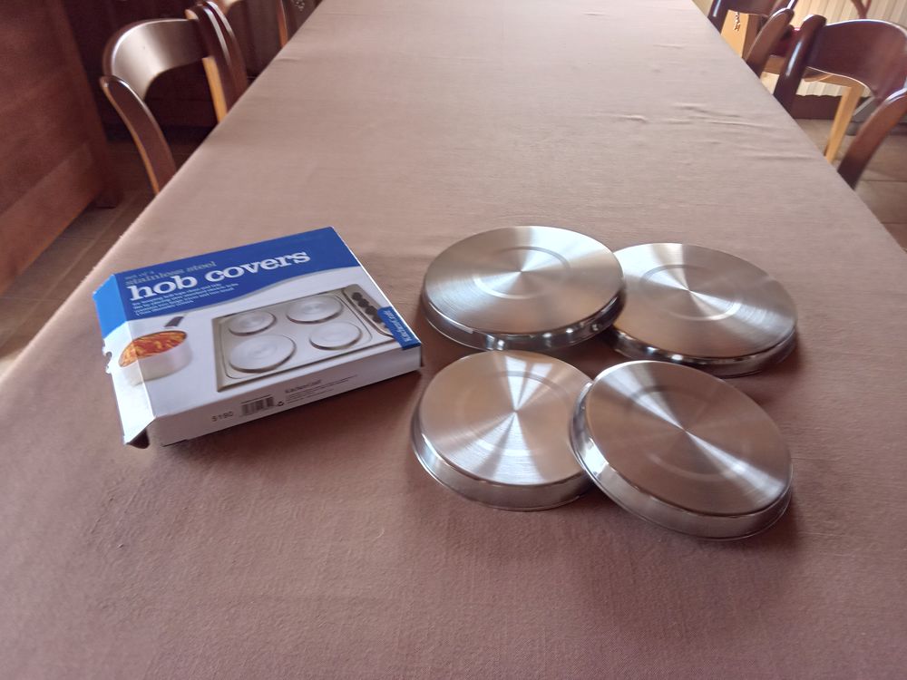 Jeu de 4 protections neuves pour plaques de cuisson. Electroménager