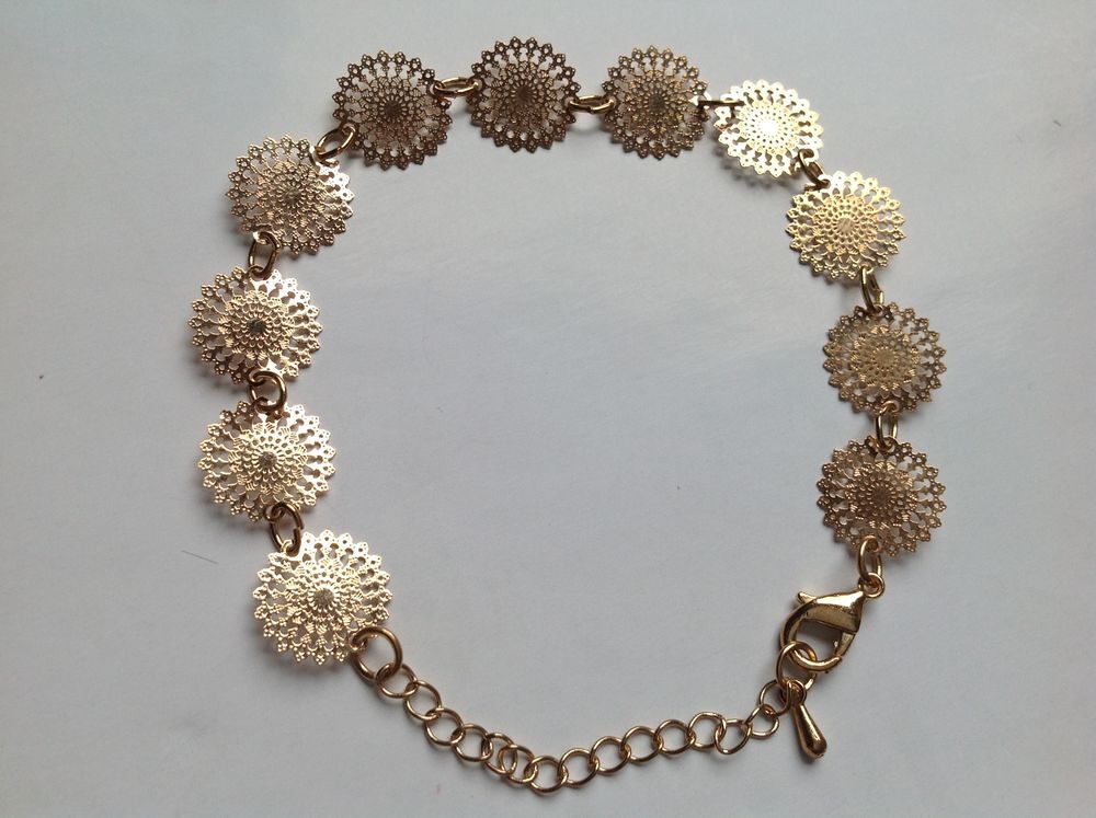 BRACELET DOR&Eacute;E FLEURS DE ViE ROSACE 23 cm Envoi Possible
Bijoux et montres