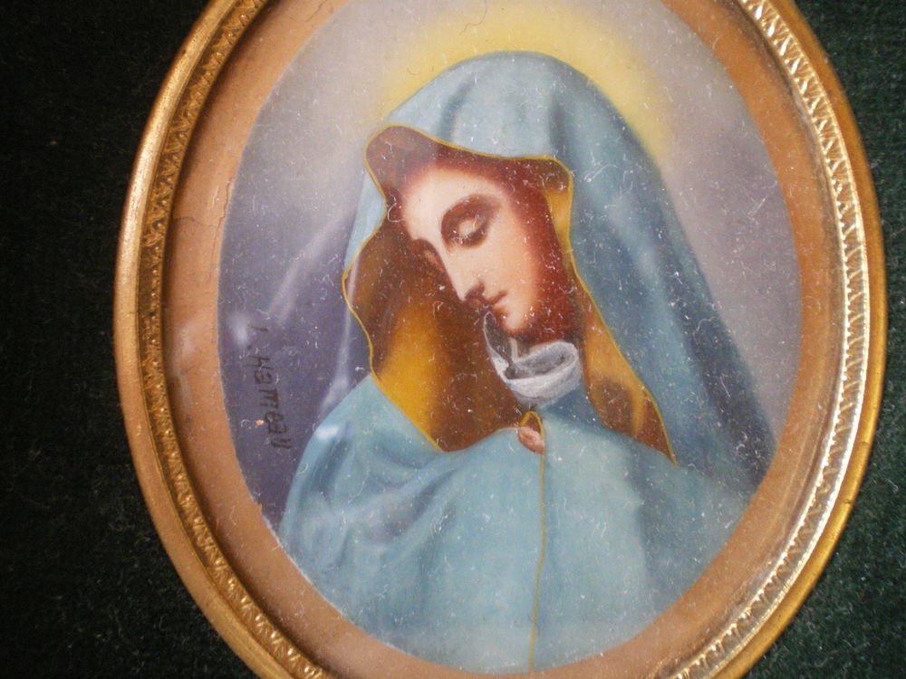 Tableau repr&eacute;sentant la Vierge par L.Hameau. 