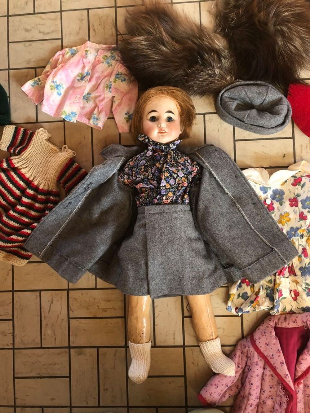 POUP&Eacute;E TETE PORCELAINE 