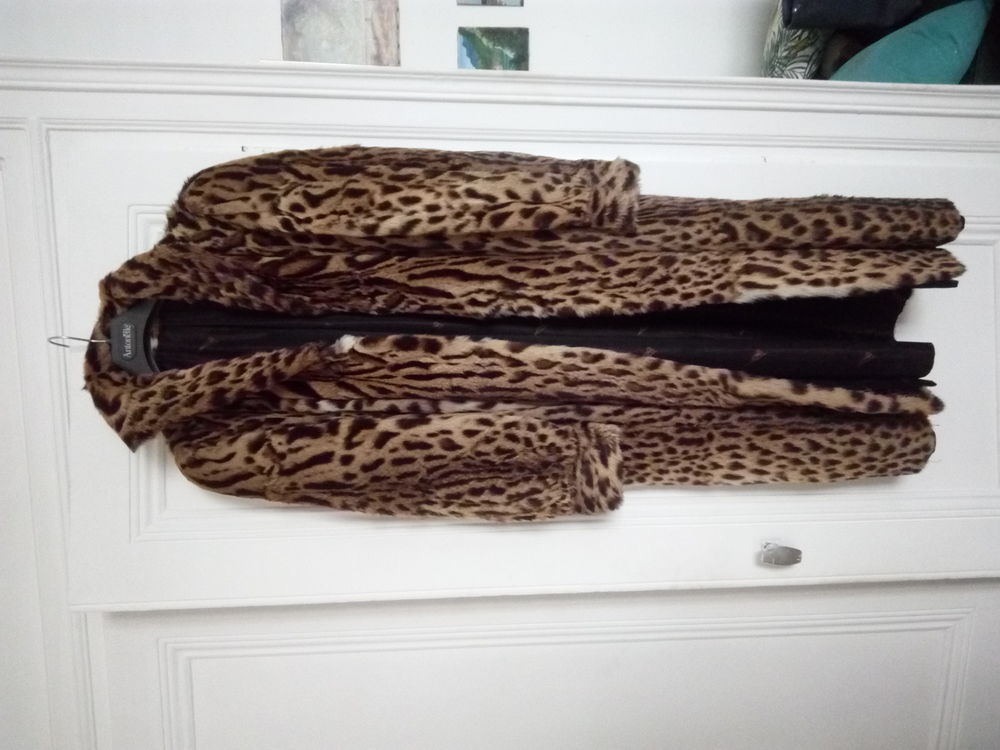 Long manteau fourrure ocelot Vêtements