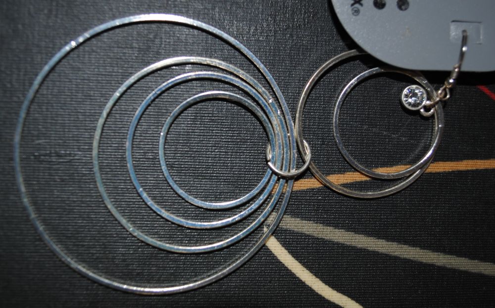 Boucles d'oreilles modernes anneaux mobiles Bijoux et montres