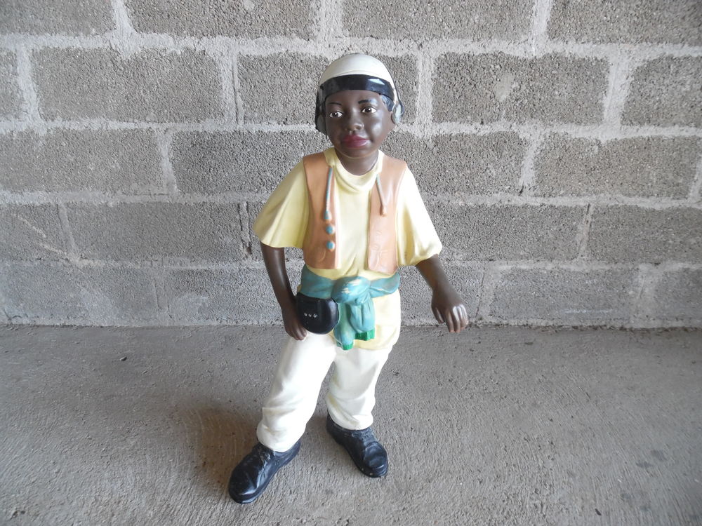 PERSONNAGE GARCON RAPPEUR
Décoration