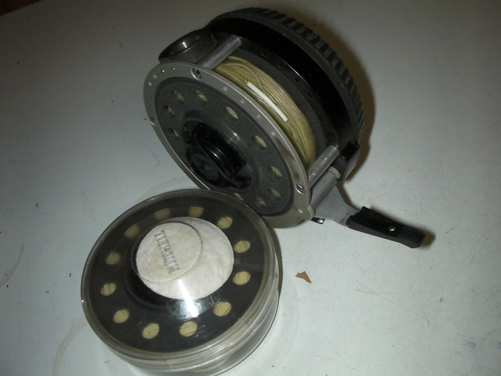 Moulinet MITCHELL 710 AUTOMATIQUE + 1 bobine Sports
