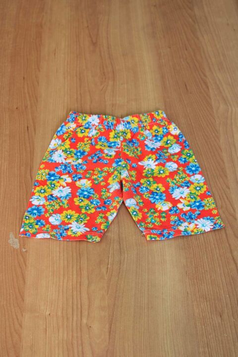 Corsaire, taille élastiquée, Orange motif fleurs, 2 ans, TBE 1 Bagnolet (93)