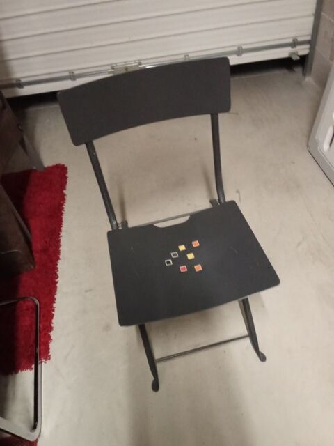Chaise m�tallique pliante.
50 Juvignac (34)