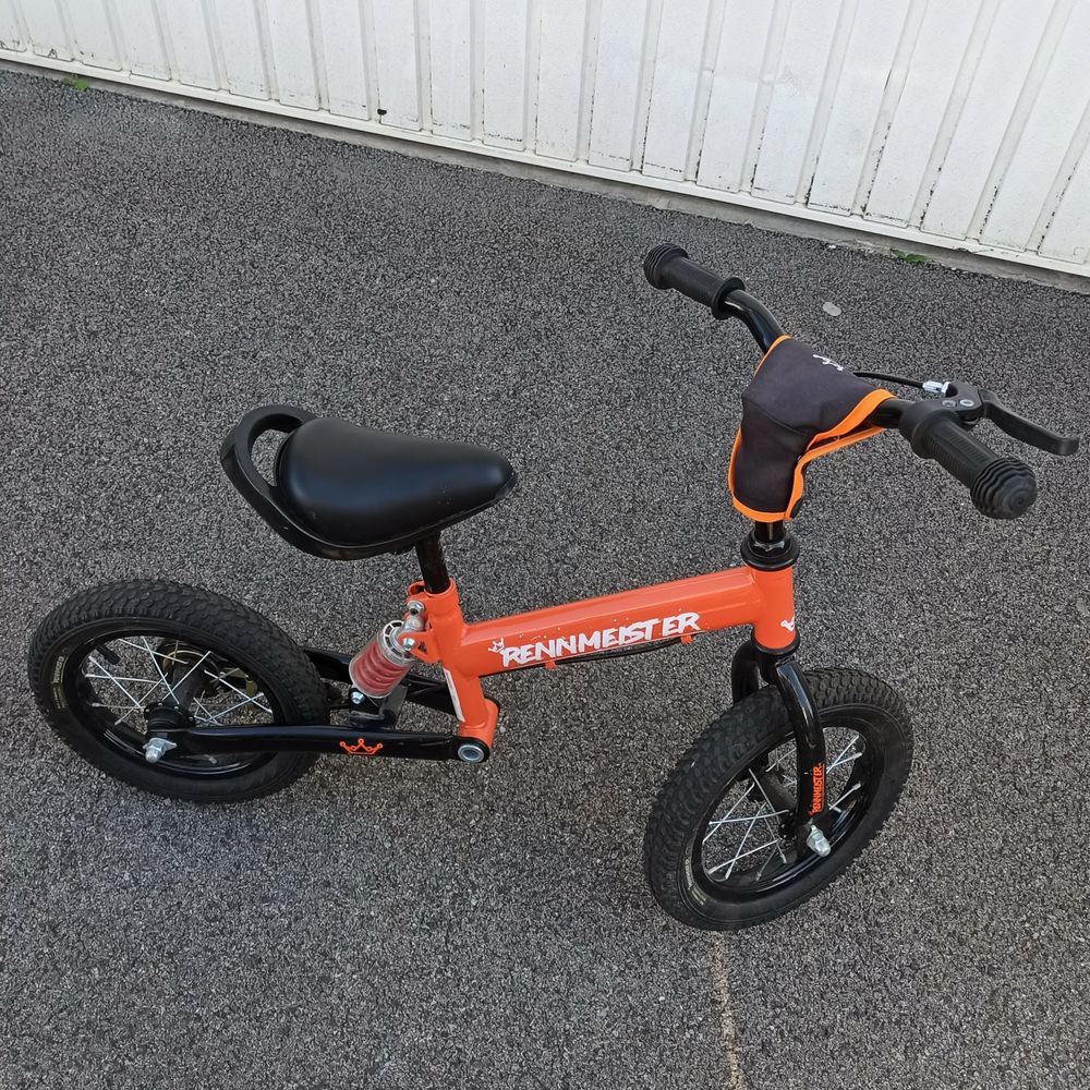 Draisienne avec amortisseur frein et b&eacute;quille excellent &eacute;tat Vélos