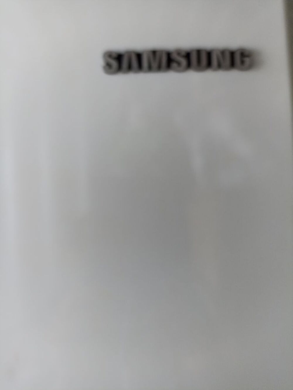un grand frigo combi Electroménager