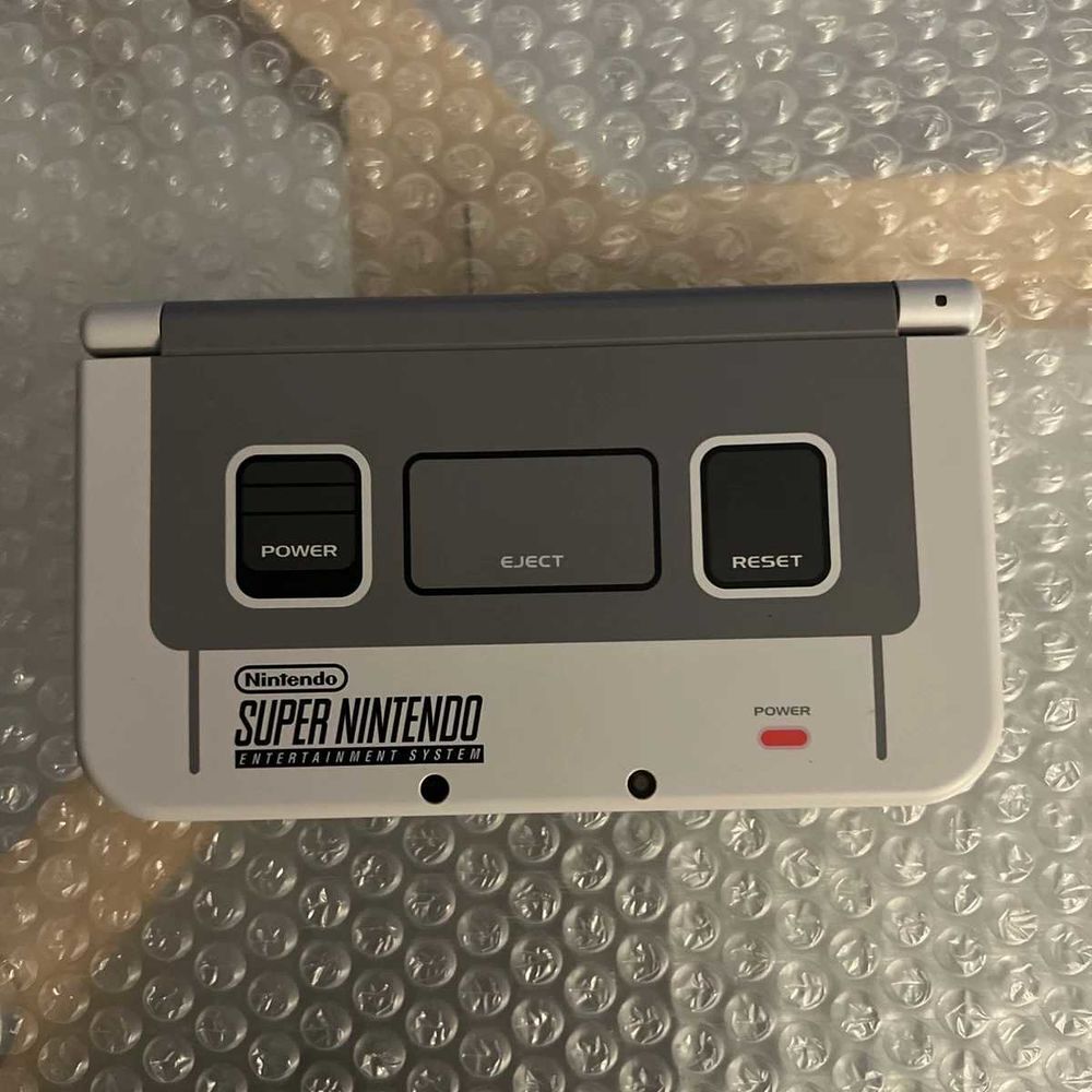 New 3ds xl &eacute;dition super Nintendo Consoles et jeux vidéos