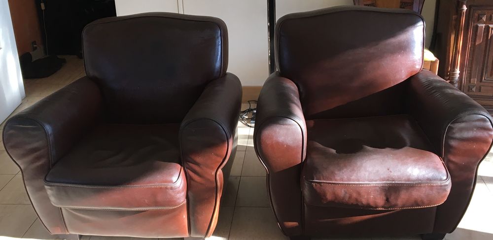 2 Fauteuils club "moustache" en cuir;
Meubles