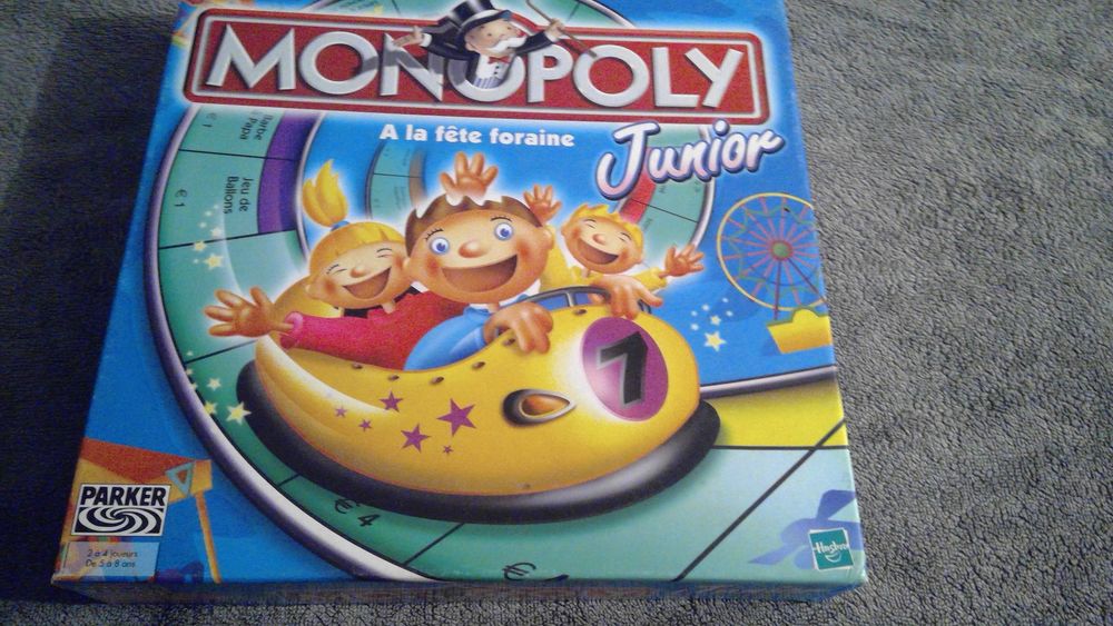 MONOPOLY JUNIOR
A LA FETE FORAINE
2 A 4 JOUEURS
5 A 8 ANS Jeux / jouets
