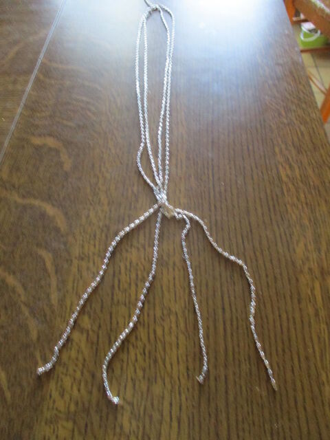 collier ou chaîne 4 en un  neuf 0 Mérignies (59)