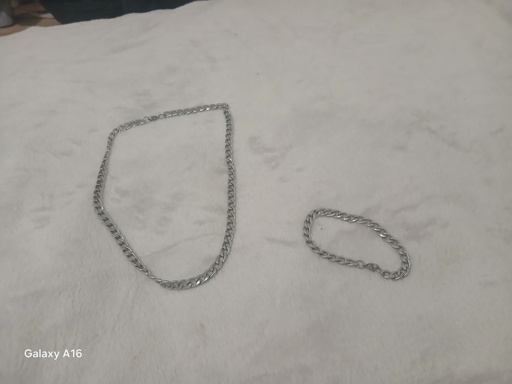 Collier plus bracelet en acier Bijoux et montres