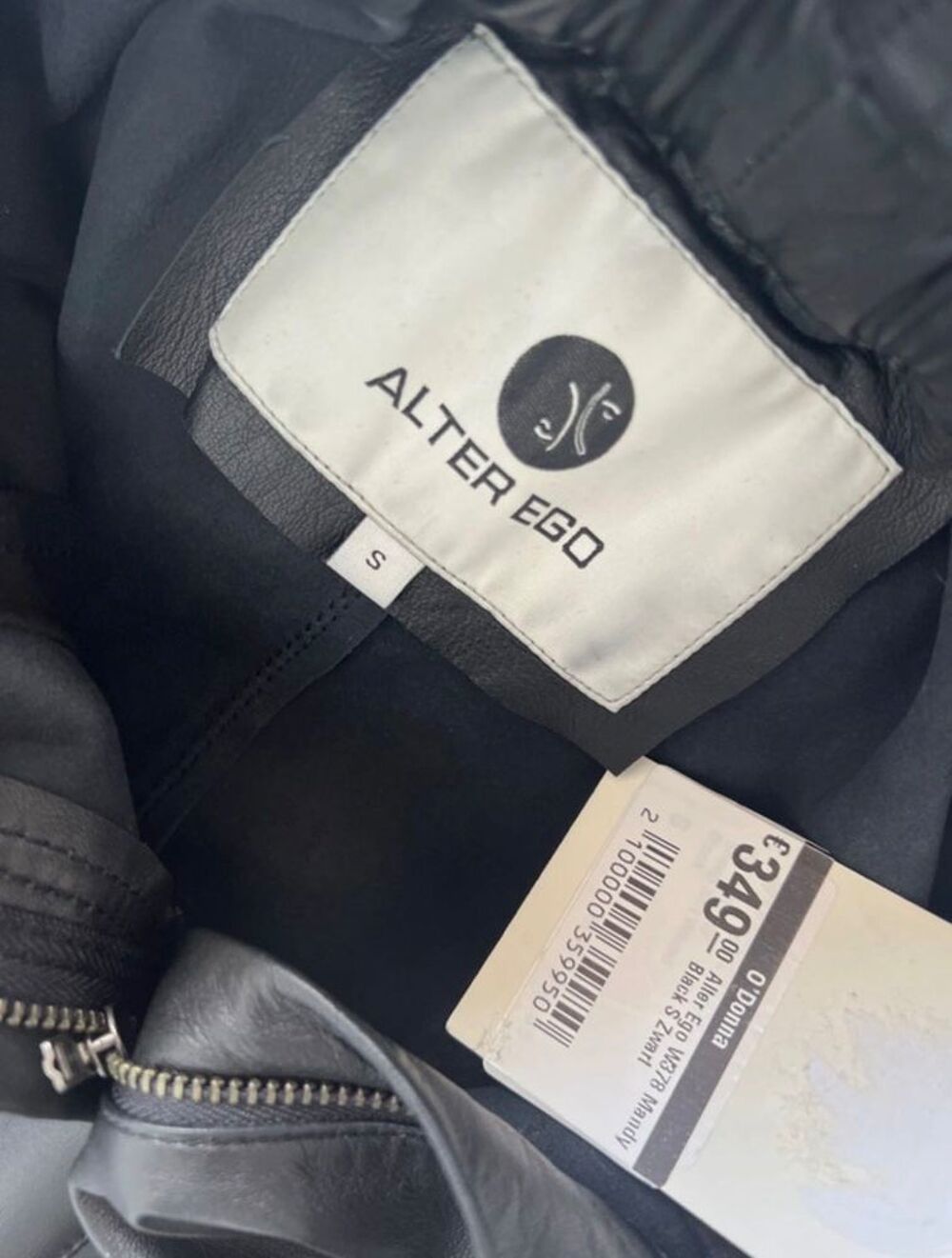 Veste en cuir Alter Ego disponible en couleur cr&egrave;me et noir Vêtements