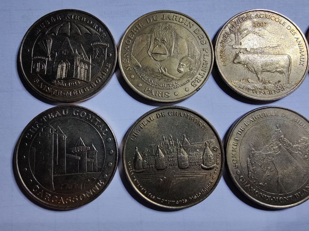 Lot de 10 jetons de la monnaie de Paris diff&eacute;rents. 