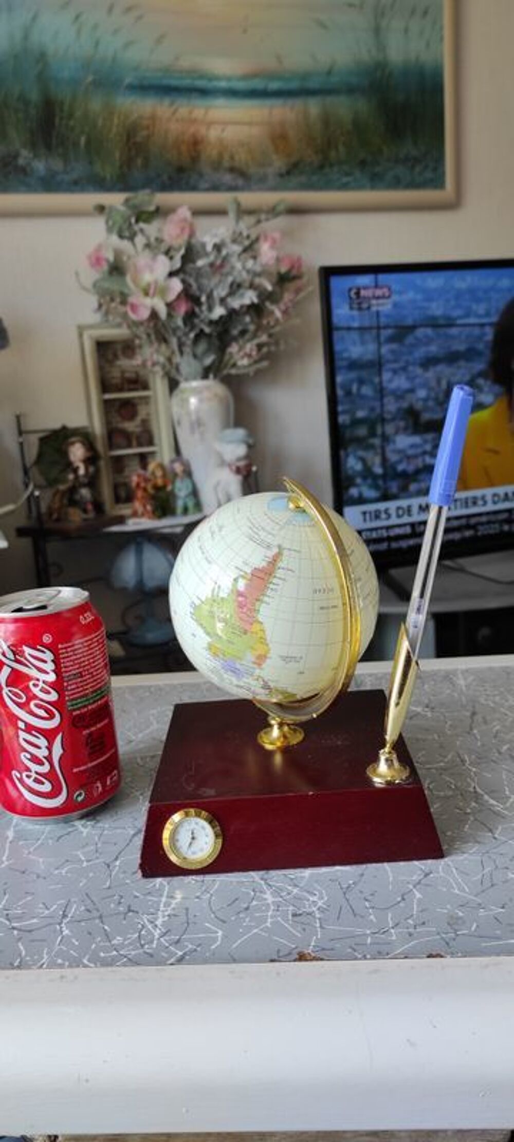 pendule sur mappemonde porte stylo
METTRE UNE PILE Décoration