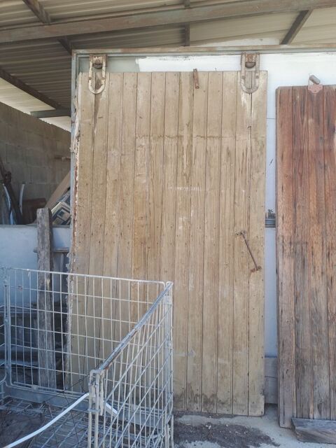 ancienne porte bois coulissante suspendue Jarcieu (38)
