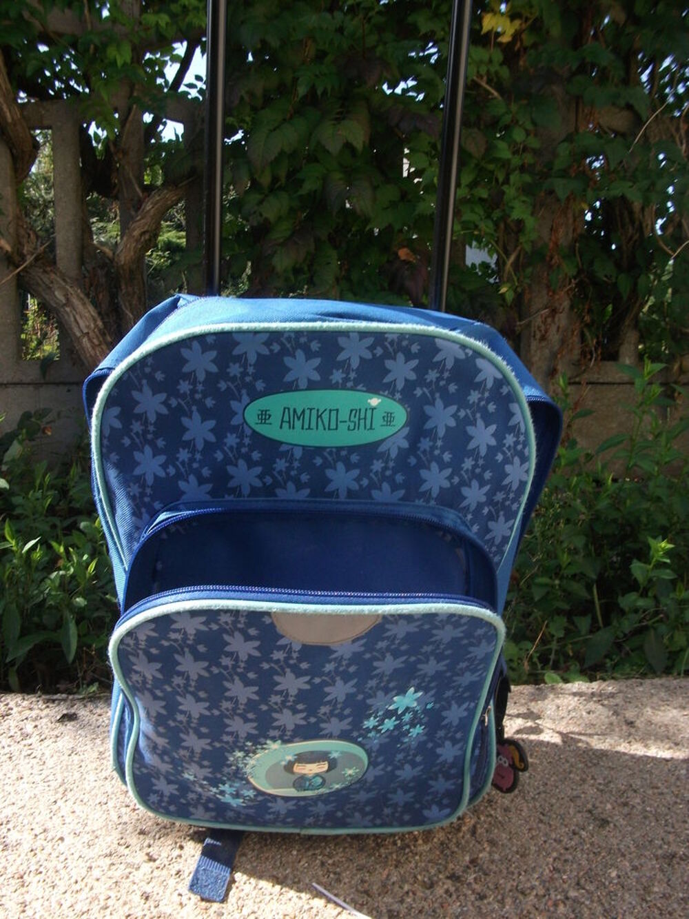 sac a dos a roulette de couleur bleu Maroquinerie