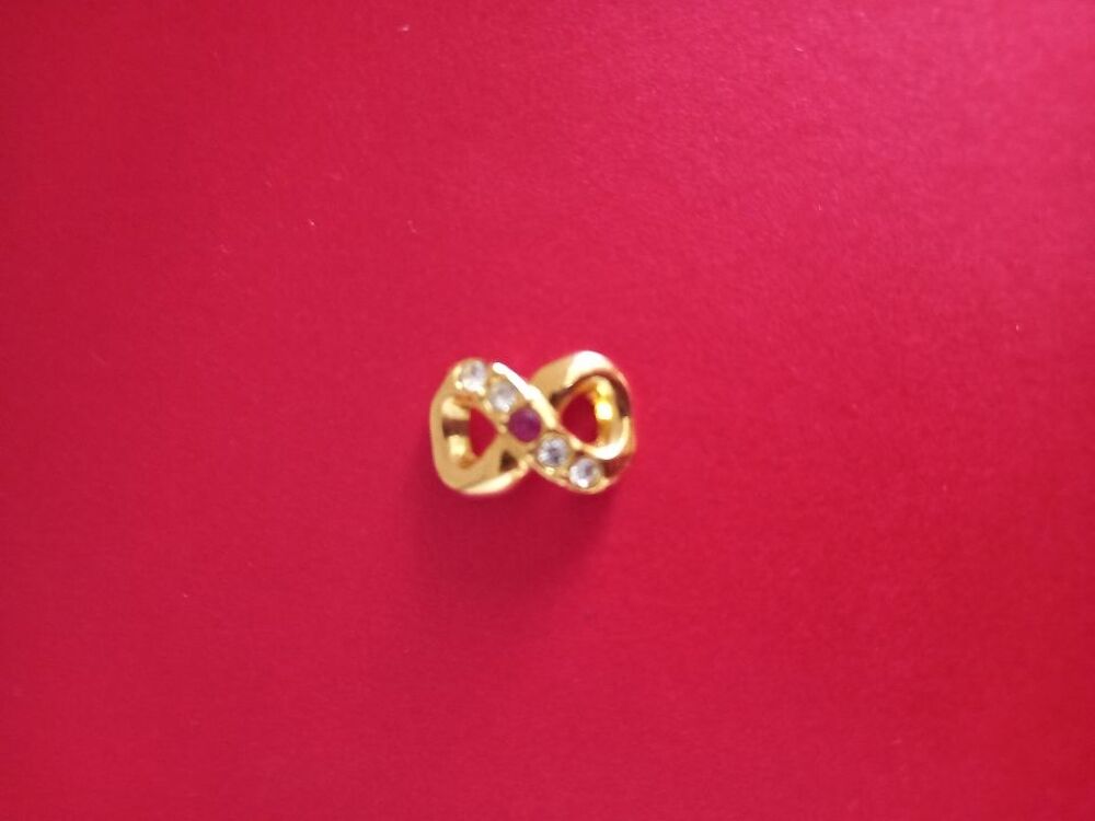 PENDENTIF FANTAISIE SIGNE INFINI Bijoux et montres