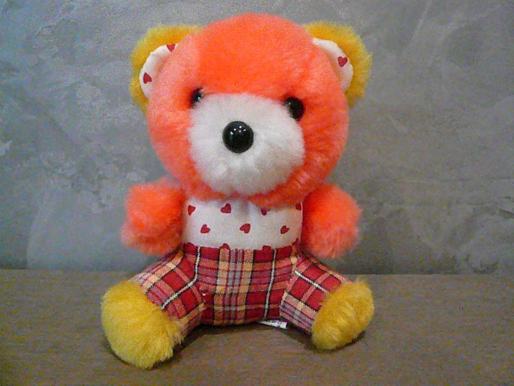Peluche nounours orange et jaune Jeux / jouets