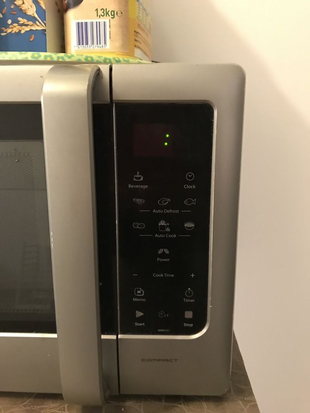 pour cause de d&eacute;part micro onde couleur gris Electroménager