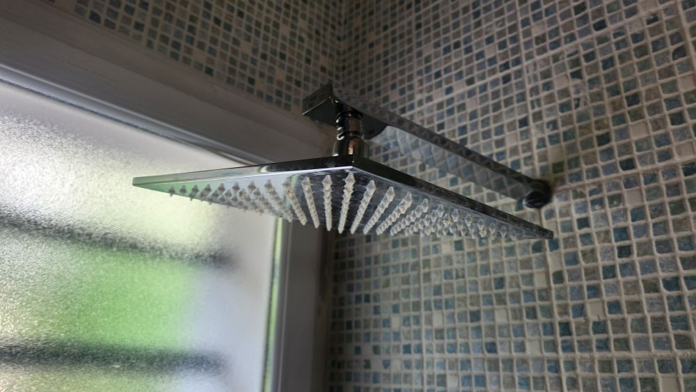 T&ecirc;te de douche Bricolage