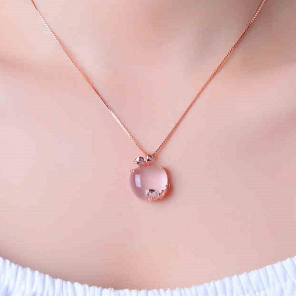 19 pendentifs pomme or rose Bijoux et montres