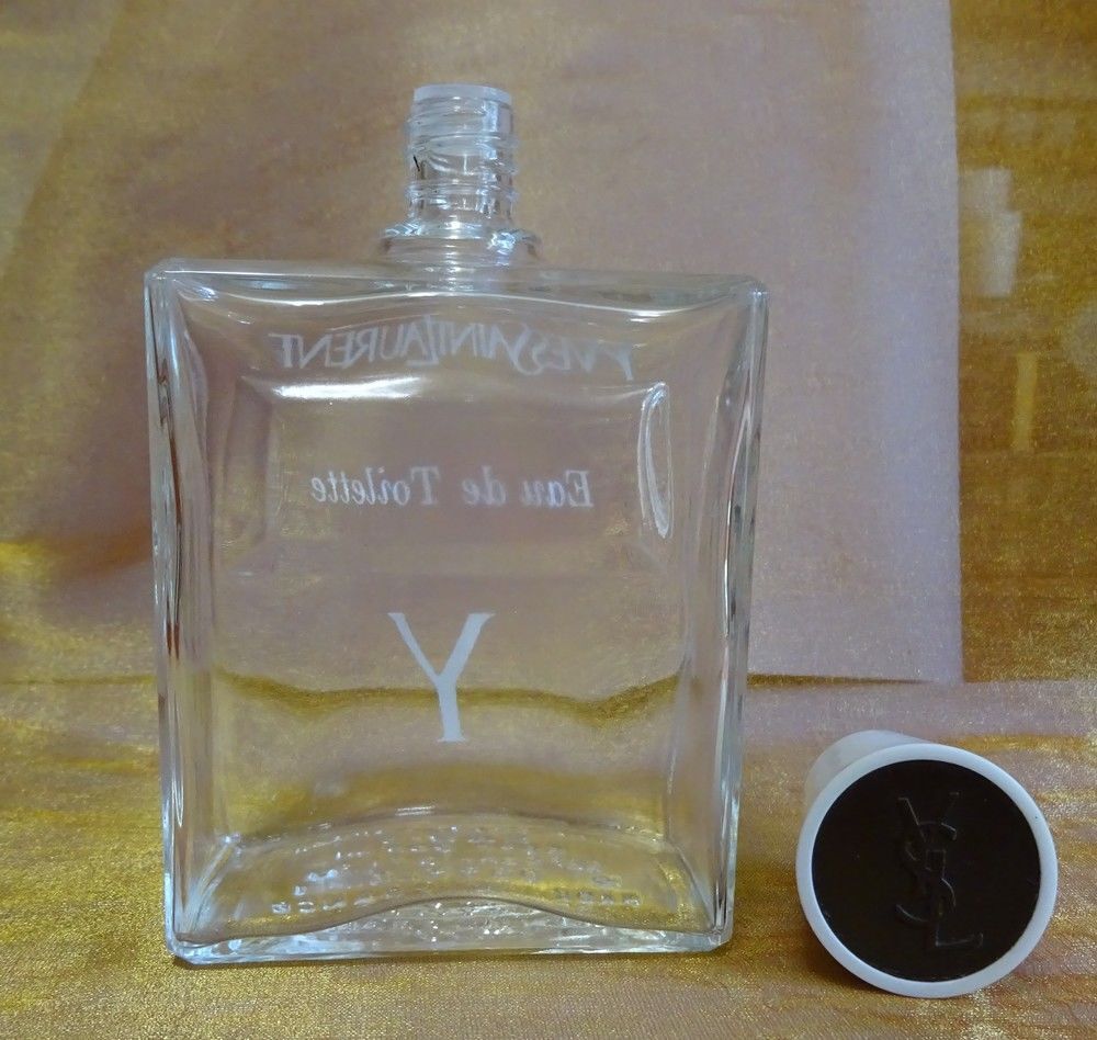 Flacons vides d'eau de toilette YVES ST LAURENT 