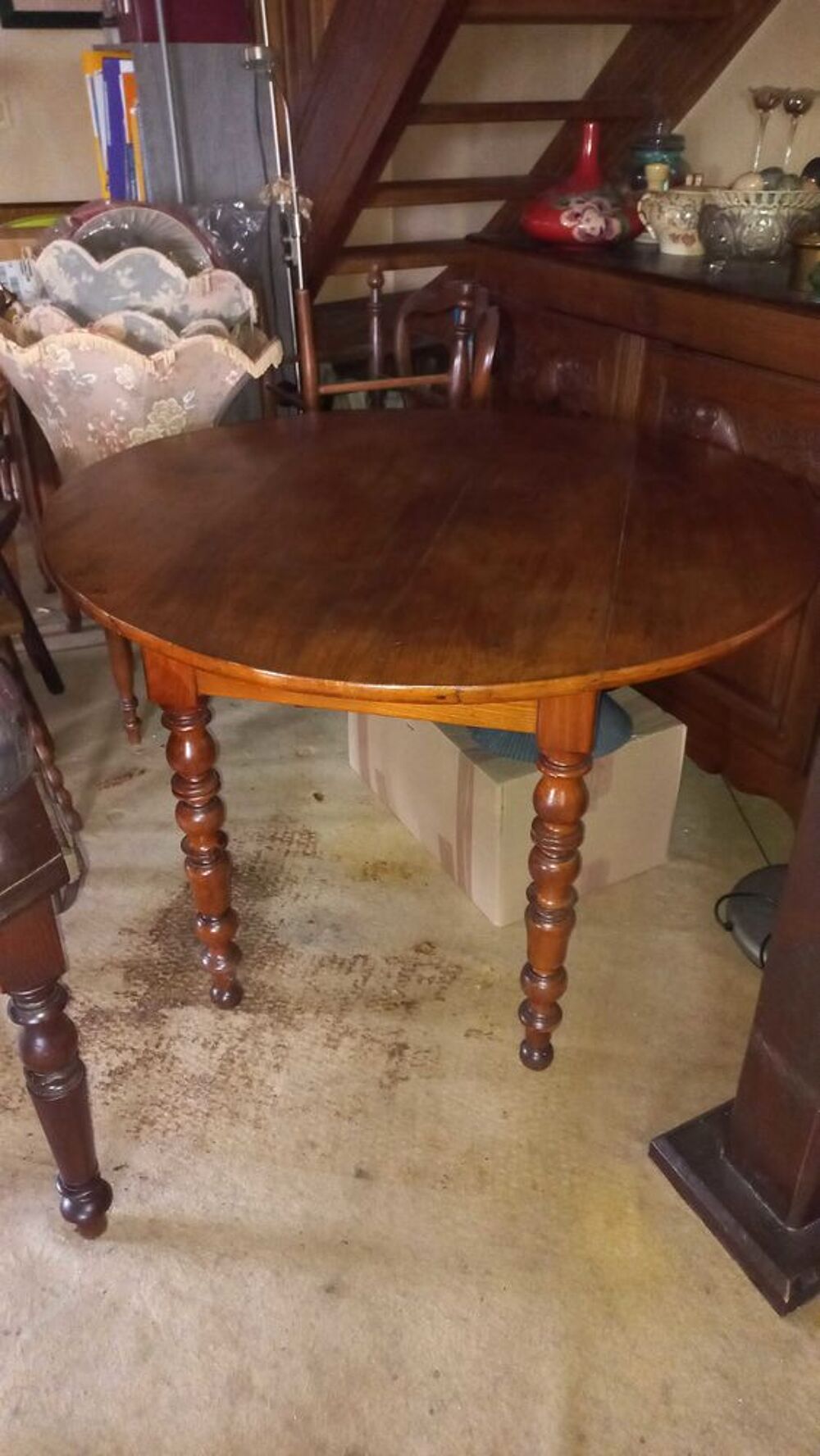 table &agrave; manger ronde en merisier Meubles