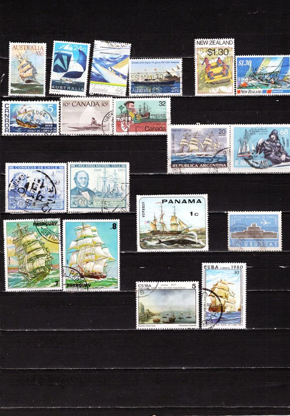 lot de 25 timbres d'AMERIQUE et d'OCEANIE avec des BATEAUX 