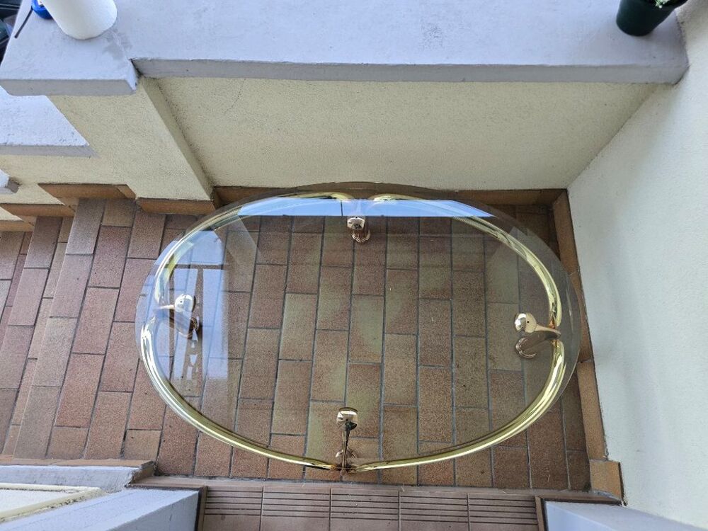 Table basse ovale verre et m&eacute;tal dor&eacute; Meubles