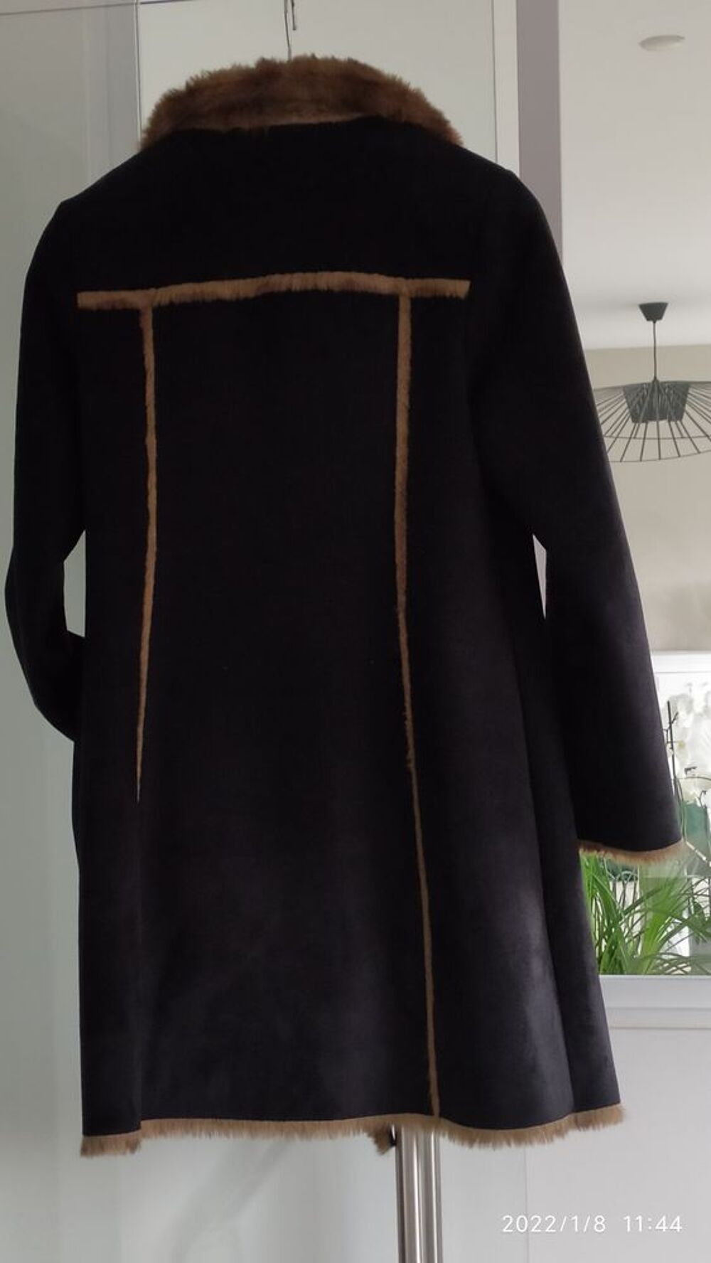 Manteau en Jean's bleu
Vêtements