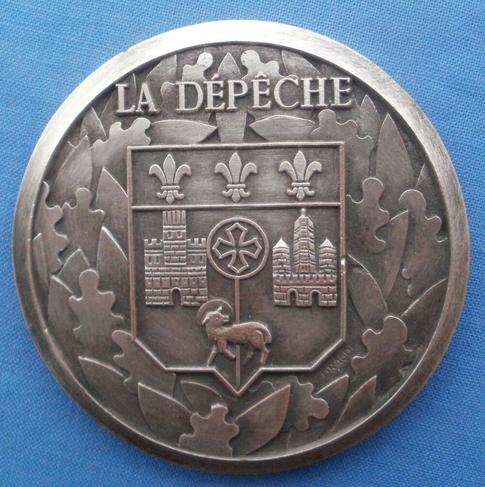 M&eacute;daille Le journal de ""La D&eacute;p&ecirc;che"". sign&eacute;e Drago" 
