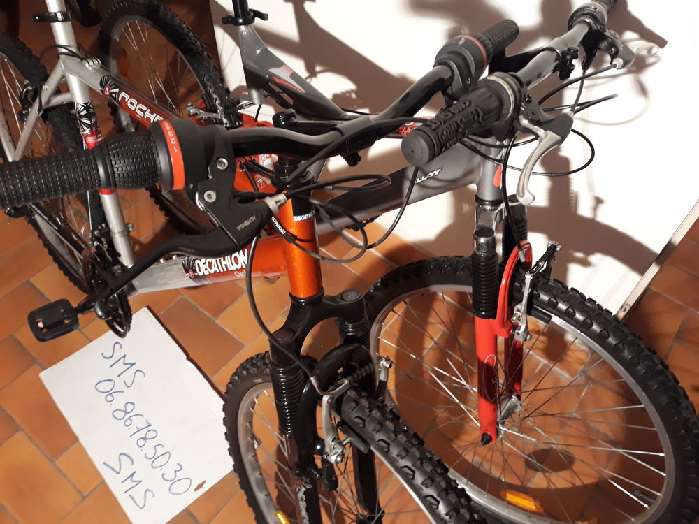 v&eacute;lo homme 26" d&eacute;cathlon r&eacute;vis&eacute; Vélos