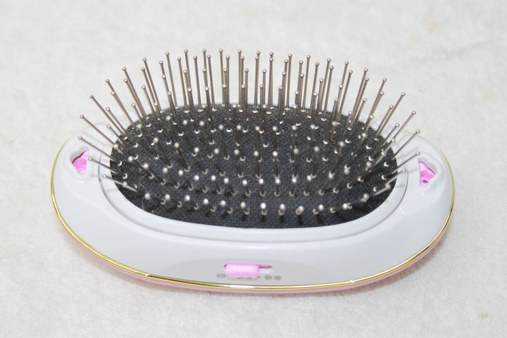 Brosse &agrave; cheveux ionique de masseur Maroquinerie