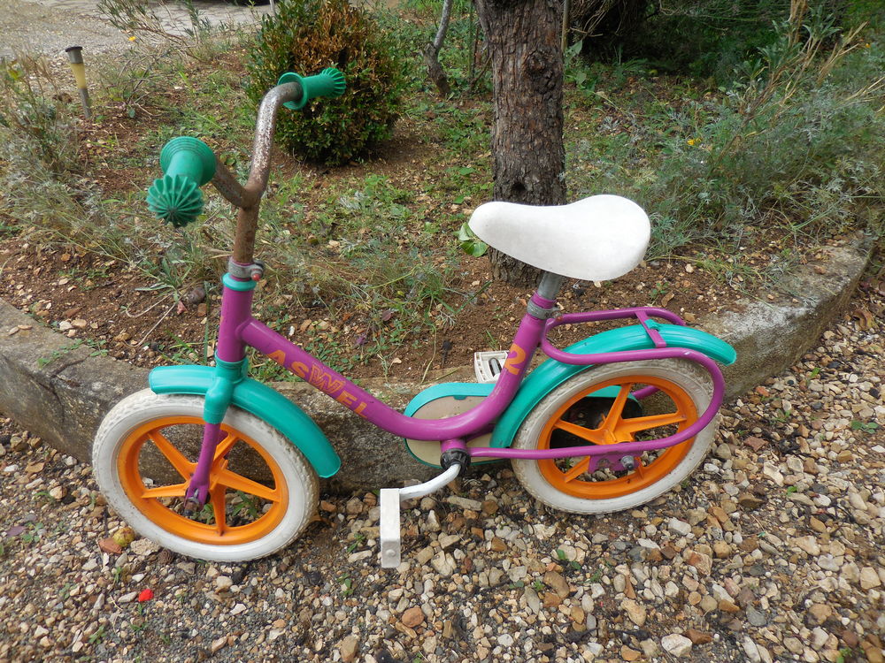 Petit v&eacute;lo vert orange Vélos