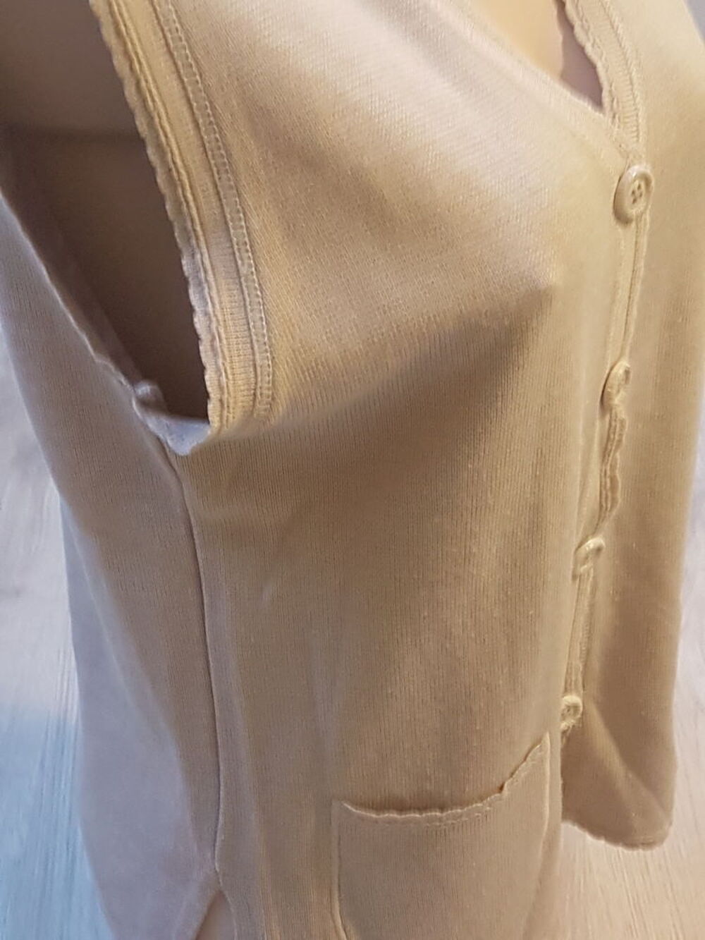 Gilet sans manche Vêtements