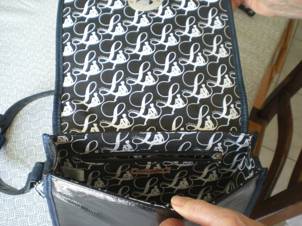 SAC A MAIN MARQUE LOLLIPOPS COULEUR NOIR COMME NEUF Maroquinerie