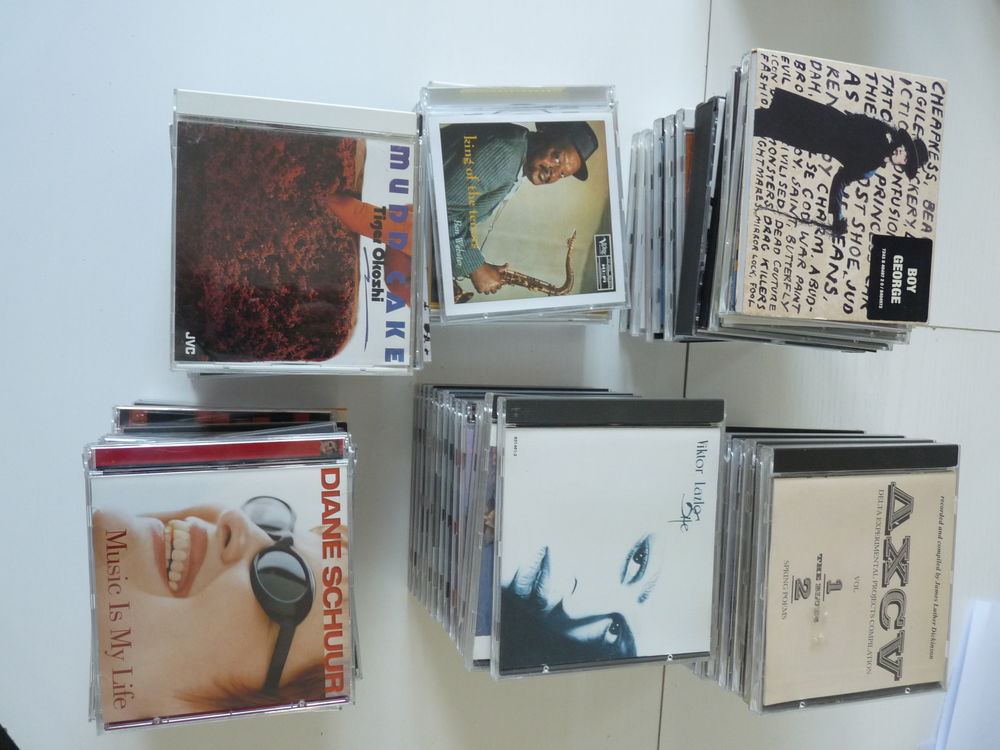 CDs en EXCELLENT &eacute;tat, disque, livret et boitier CD et vinyles
